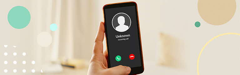Mobile phone showign an incoming call from unknown person