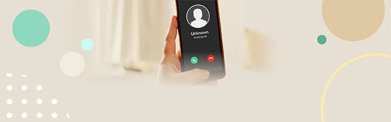 Mobile phone showign an incoming call from unknown person
