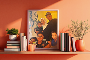 Photo frame of a Malay family on a shelf