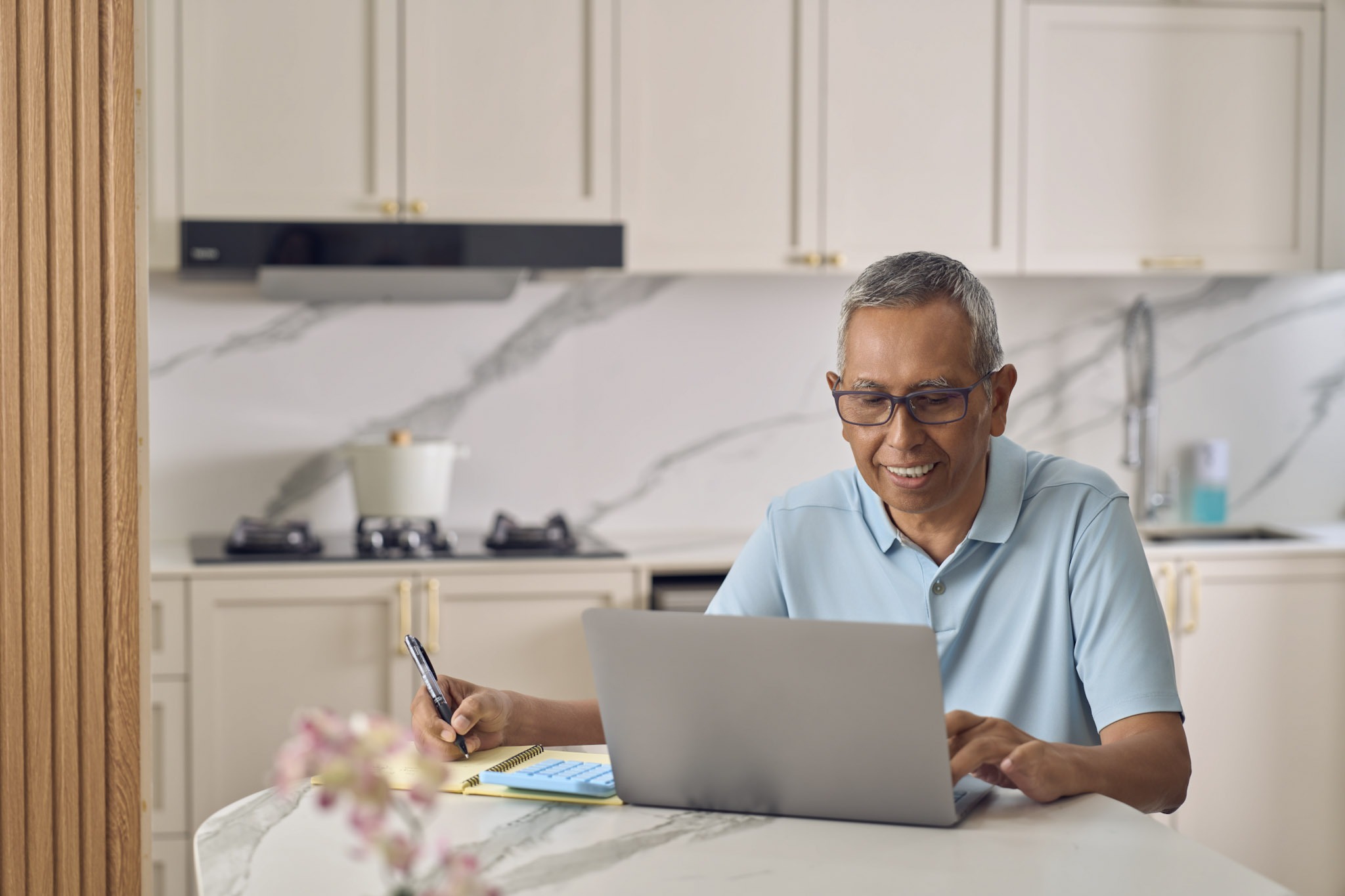 Senior man using laptop