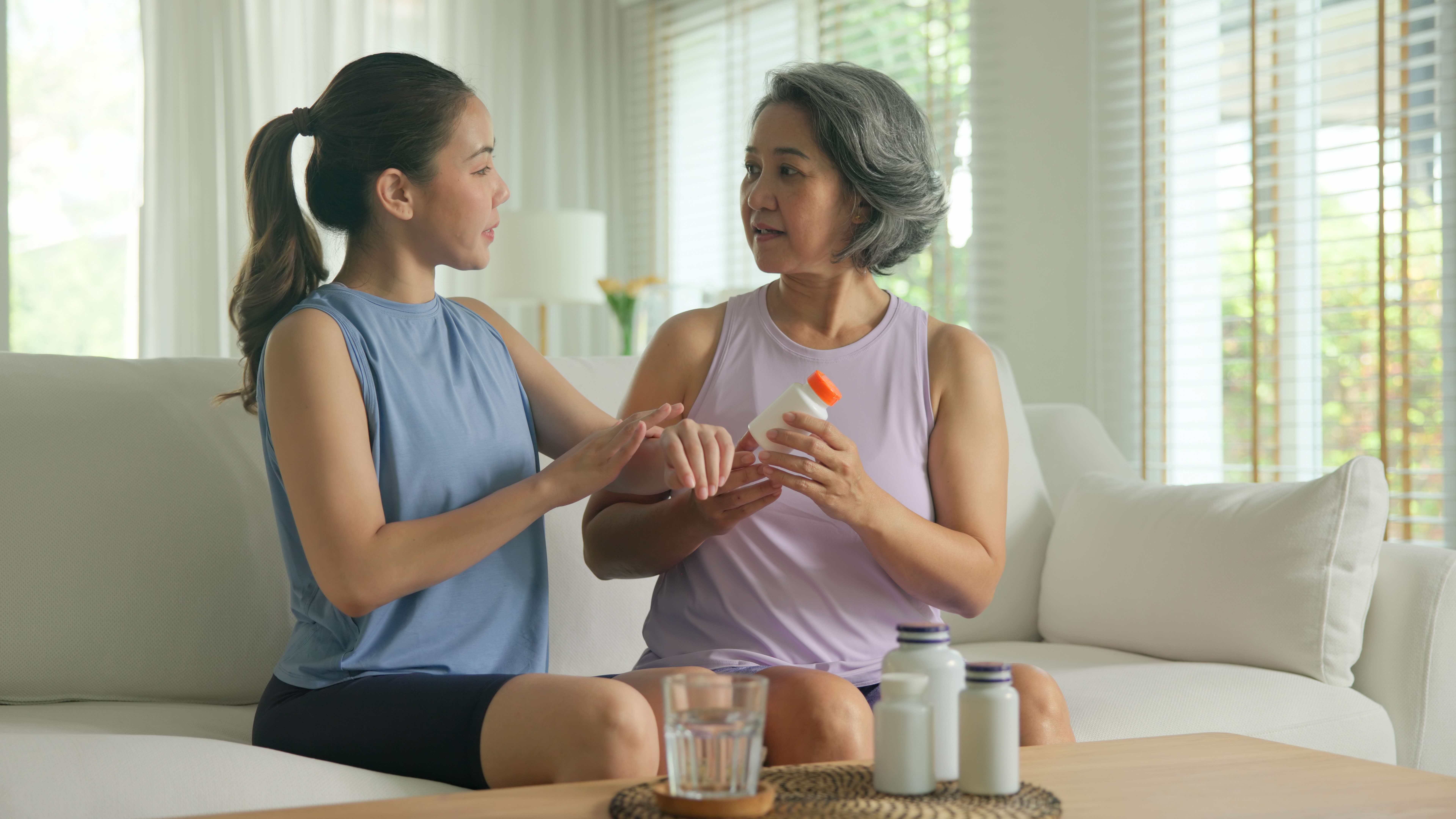 young lady and mother discussing healthcare options