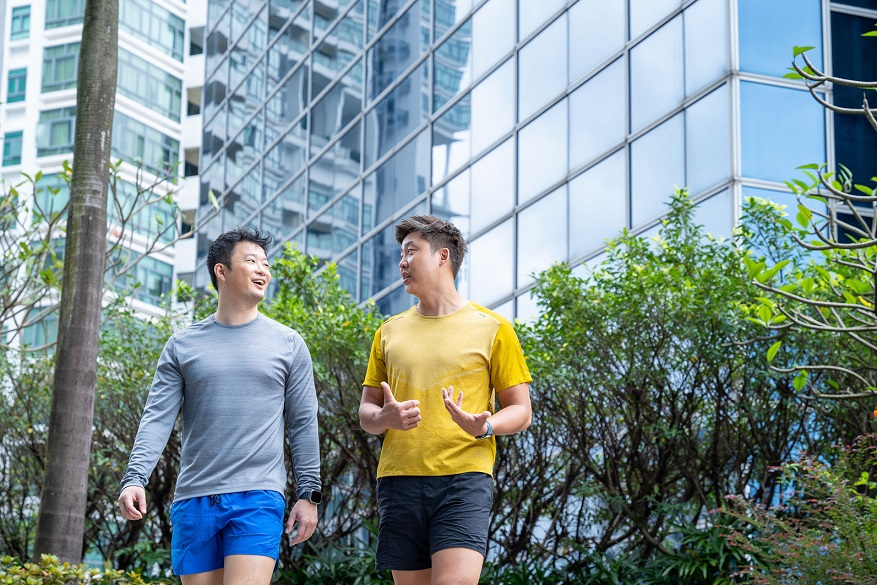 Two men walking in the outdoors