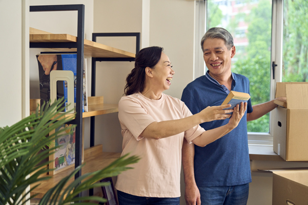 Senior couple moving into their new home
