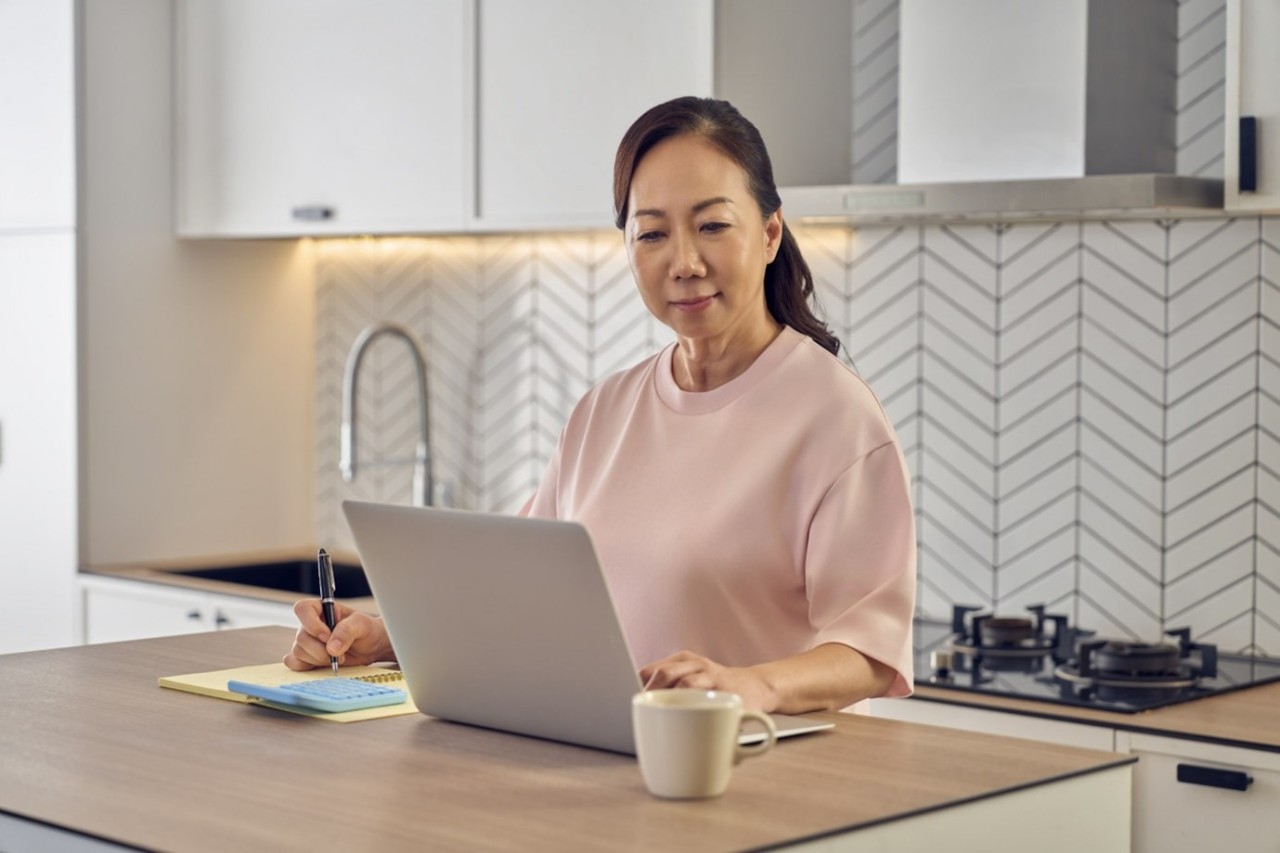 Lady confidently working on her finances