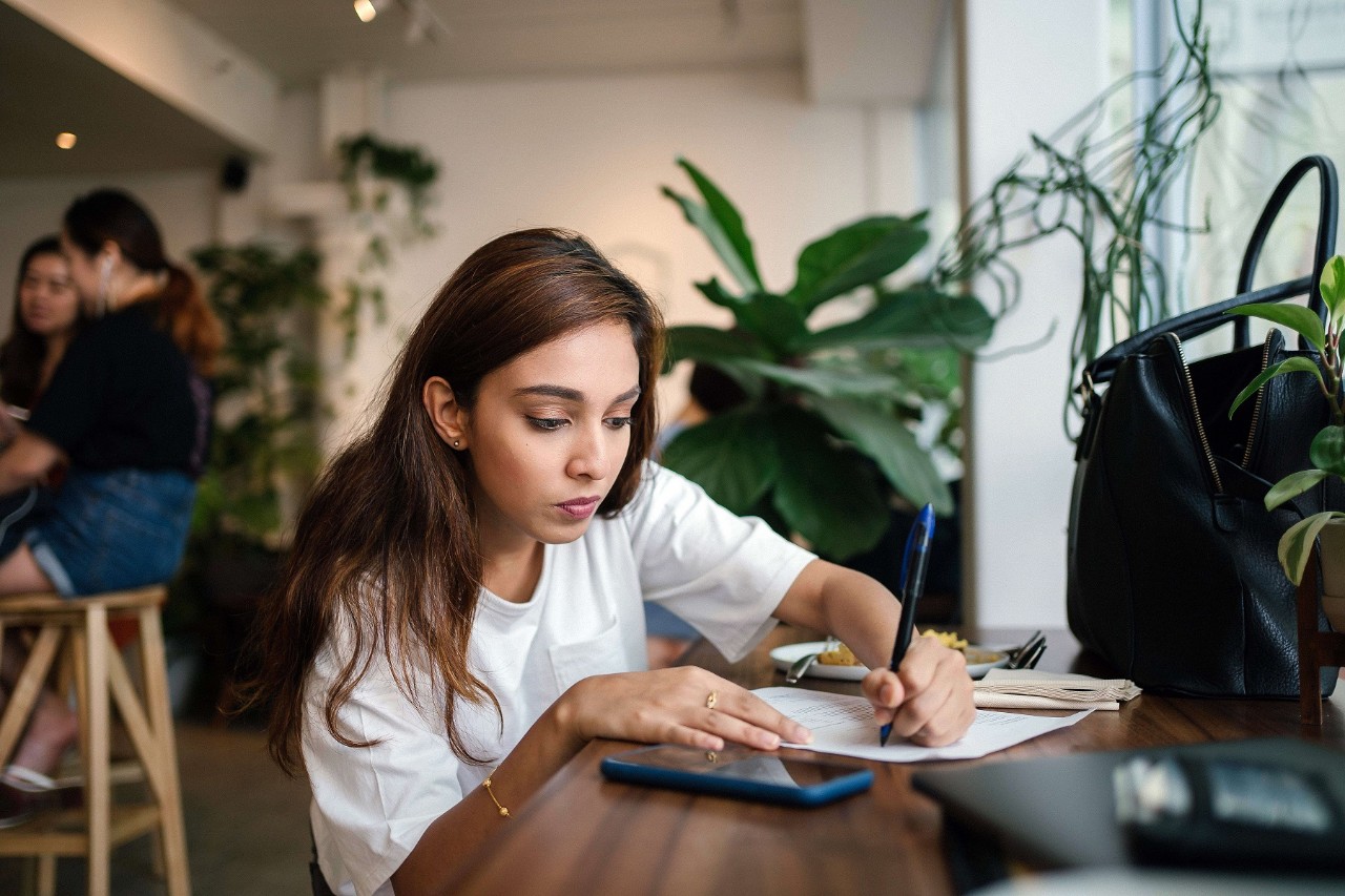 young lady working at a cafe