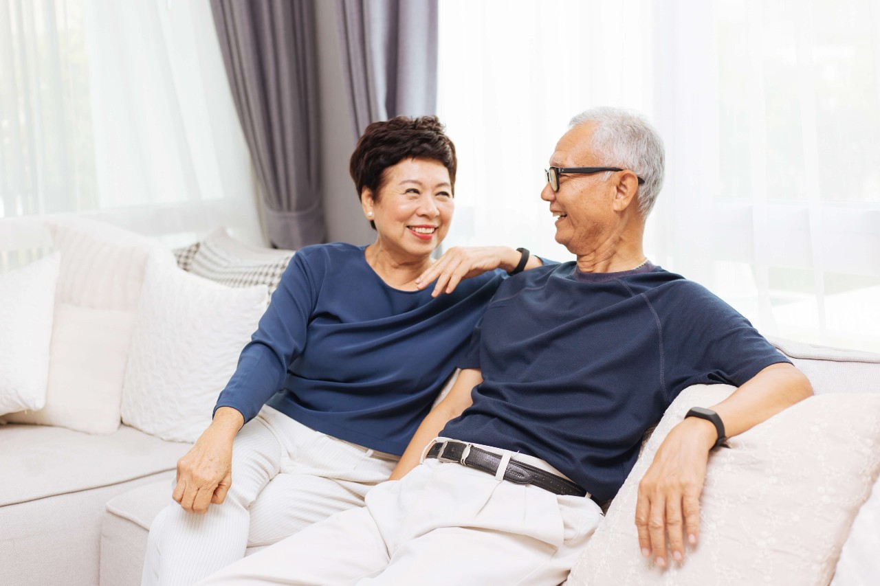 elderly couple happy in their home