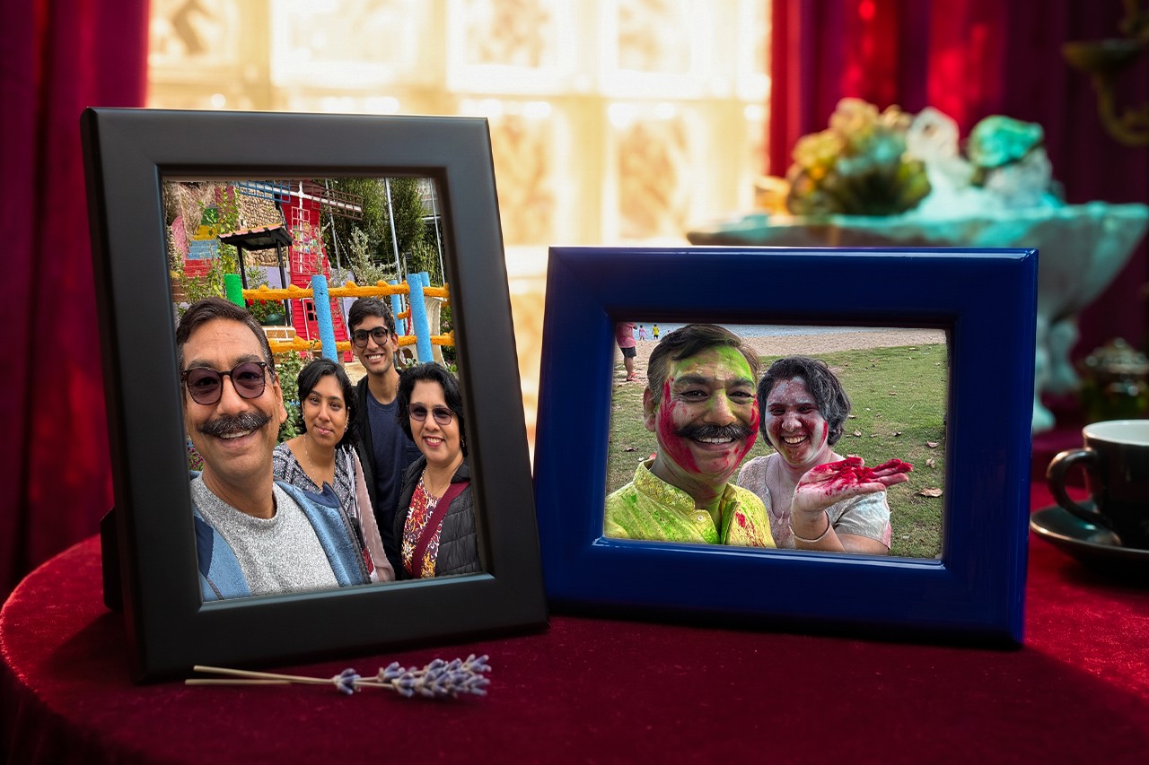 2 photo frames of a family