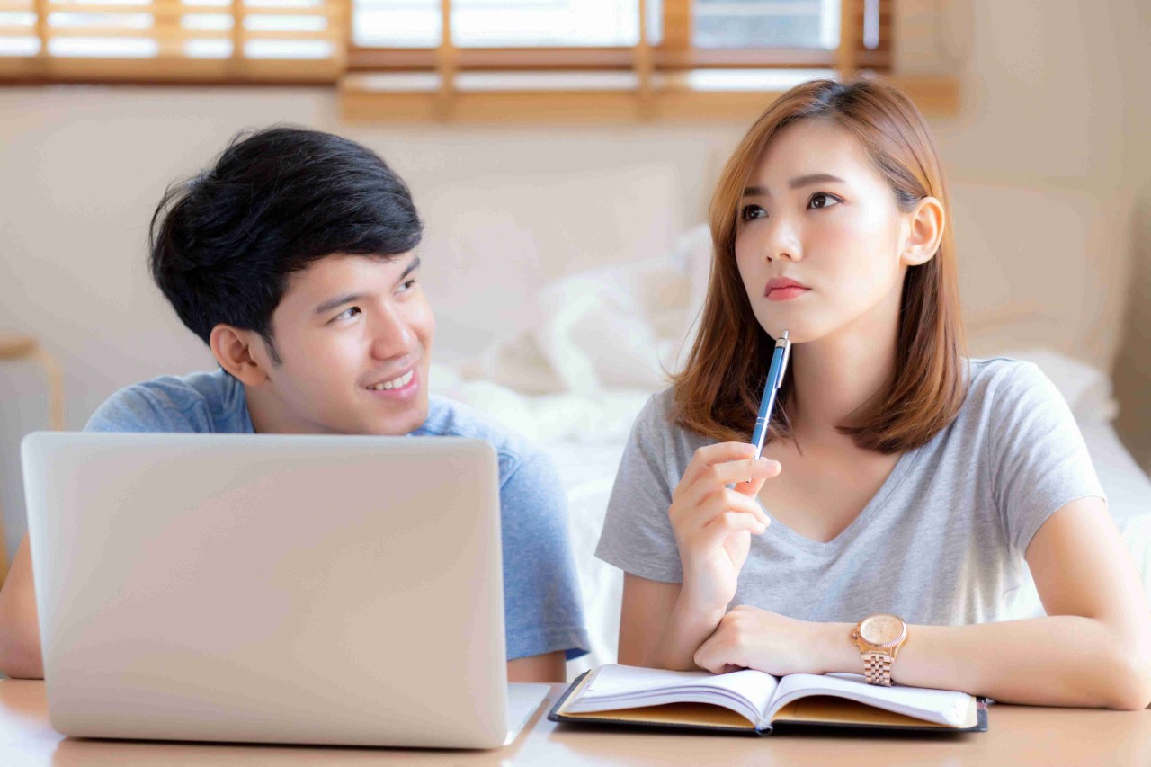 Young couple in deep concentration 