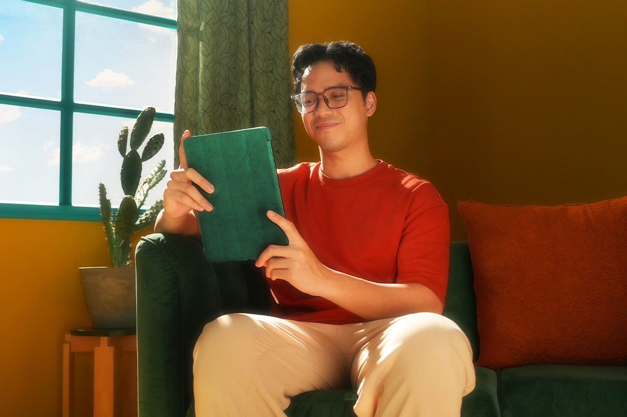 Guy looking at iPad