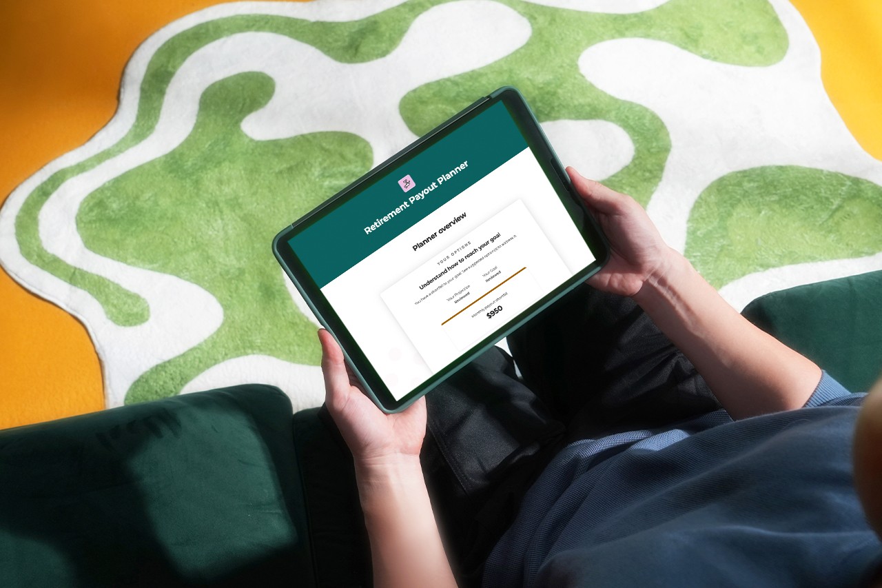 Someone using an iPad to do financial planning