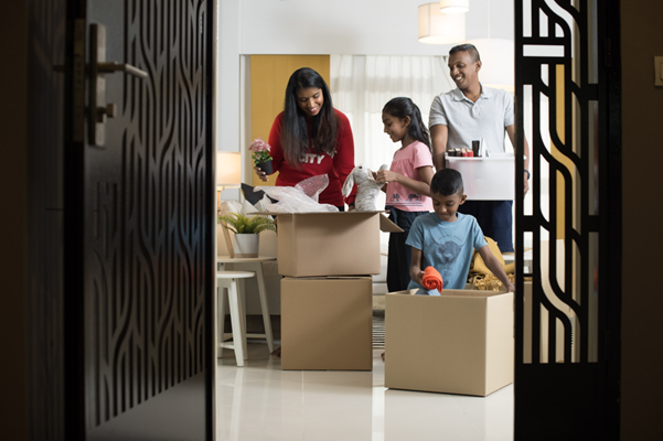 Family unpacking things at home