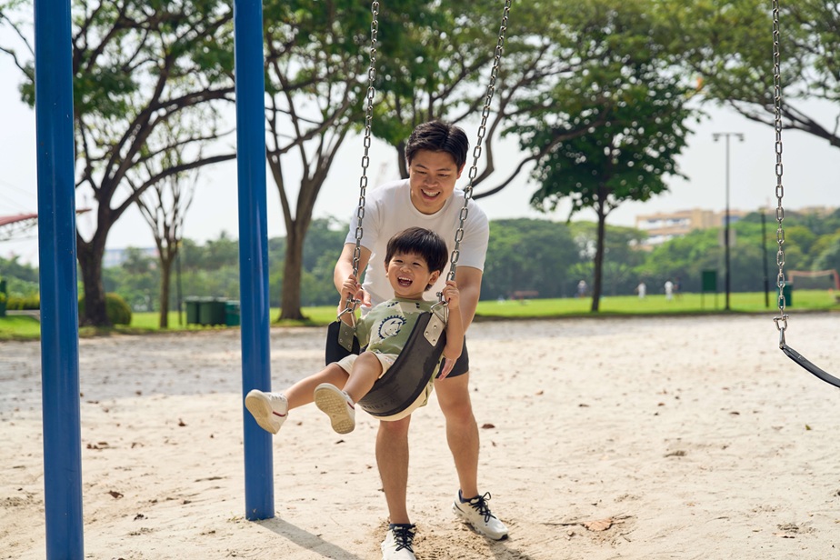 Father and son at the playground