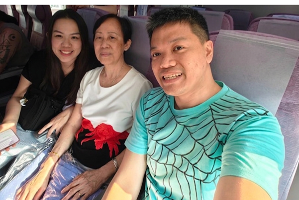 Mr Chin with his family