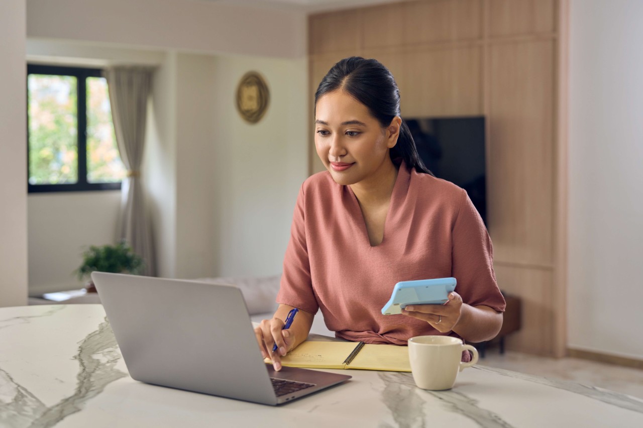 Young adult planning her healthcare expenses