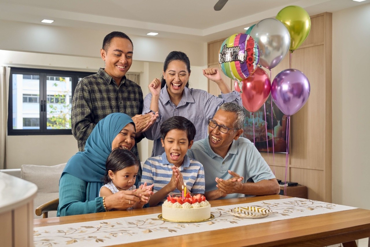 Family celebrating a birthday together