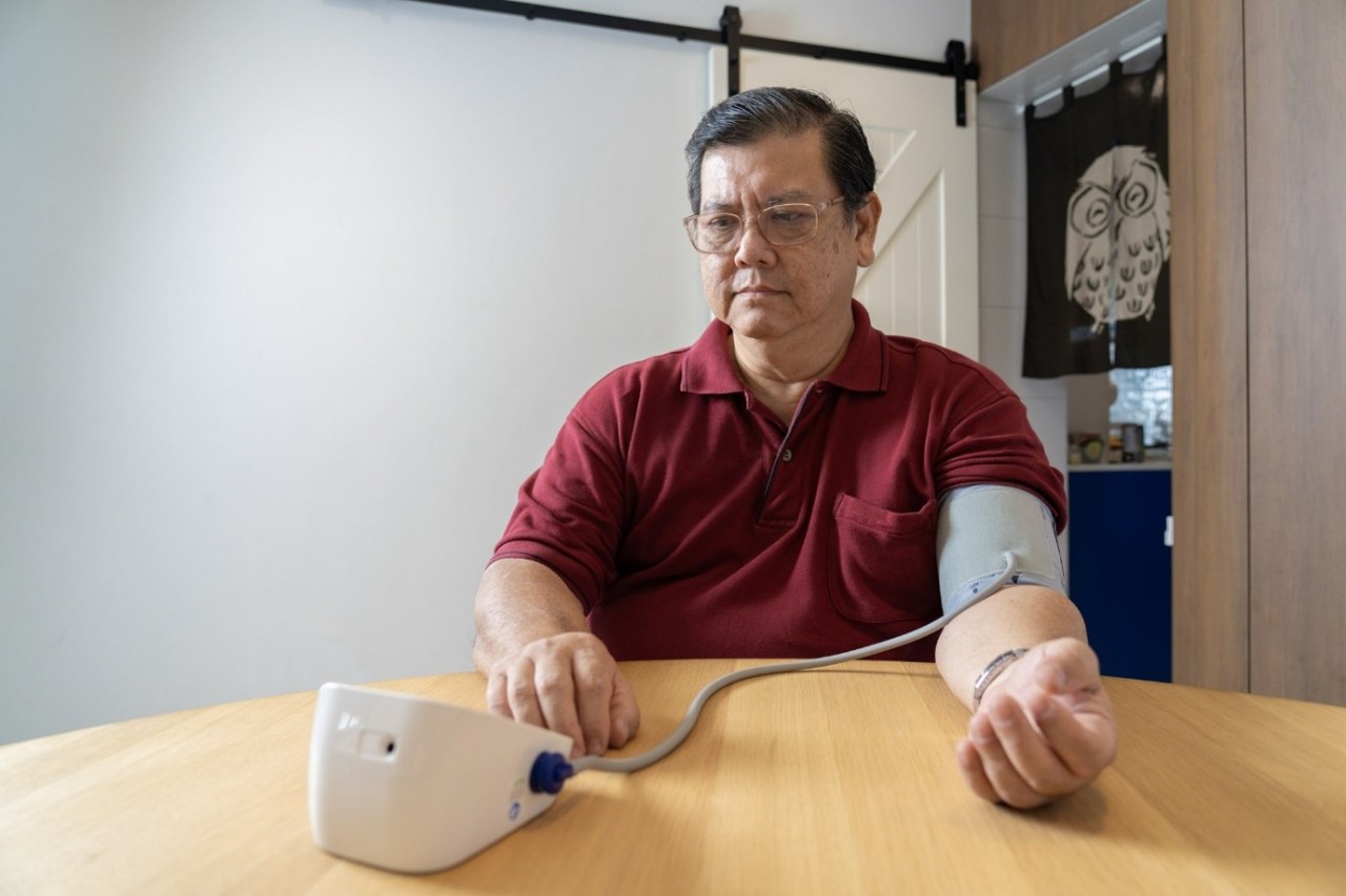 Man taking his blood pressure