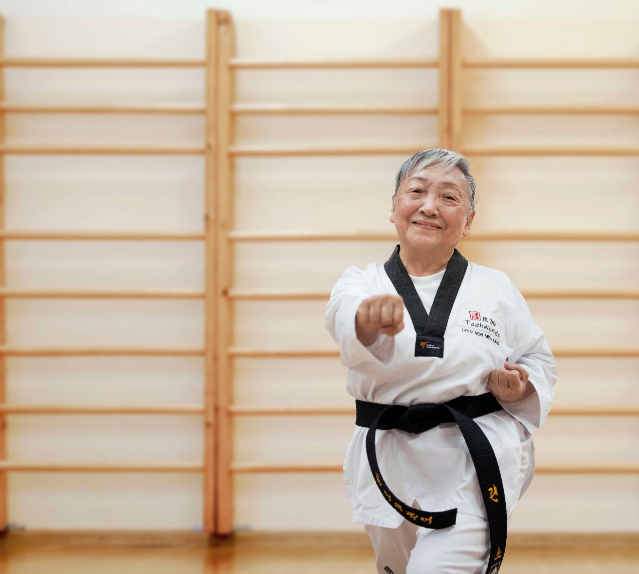 female practising taekwondo